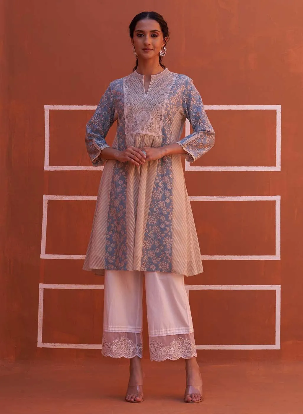 Blue schiffli A-Line Kurta with Yoke Sequins Work